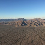 Flying high above the Vekol Valley, looking NE toward the Sierra Estrella Mountains and Seven Mile Mountain.